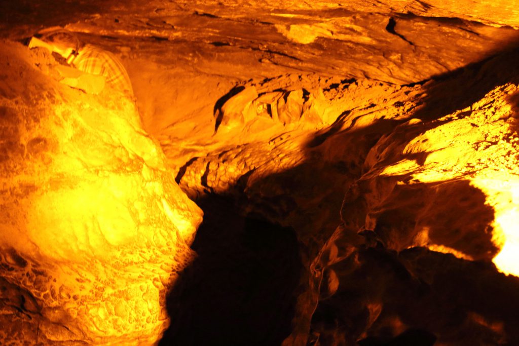 'Fat Man's Misery'  - a water-cut groove in the cave floor winds it's way along with the entire tour group shifting, twisting, and turning to squeeze through the passage.
