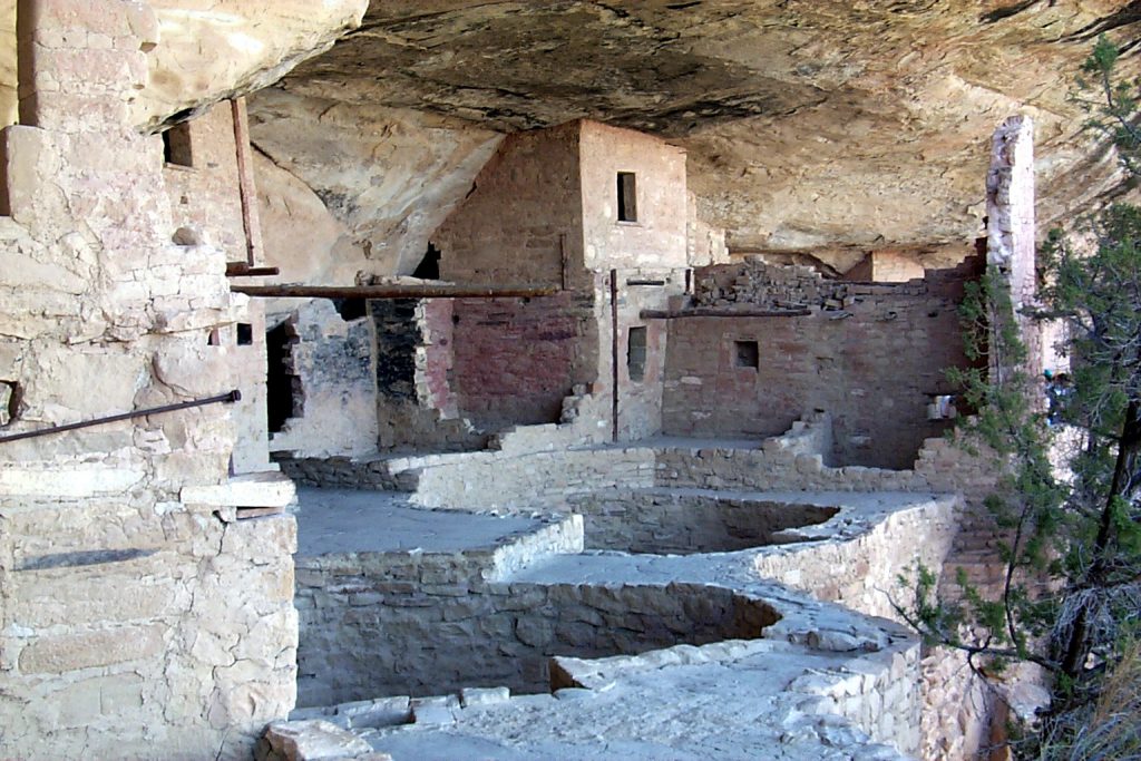 Here is a close-up of one of the dwellings. The open pits would have been covered with wooden roofs and these are the Kivas. The rooms with single entrance ways (doors not windows) would have been used for storage.