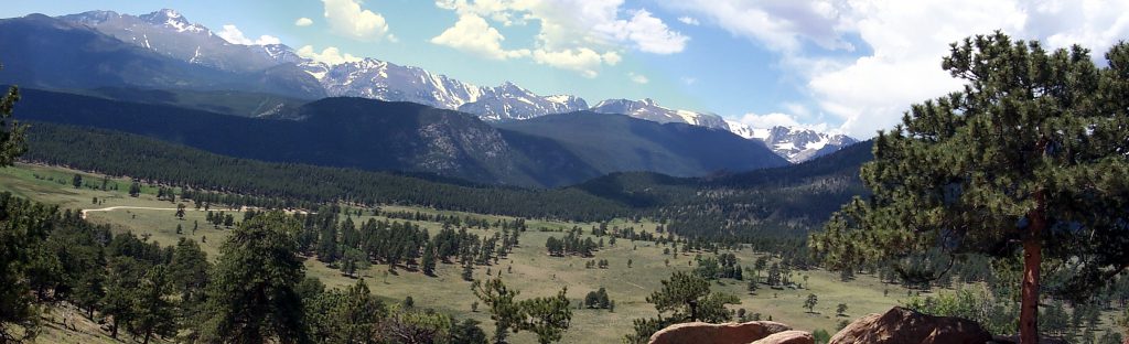 This panoramic view provides a view of both parts of the valley as viewed from much higher up! You can see the rocky river bed of the previous photo about centre and the lower valley off to the right. You can see the road crossing the valley floor and make long switch backs up the western side of the valley.