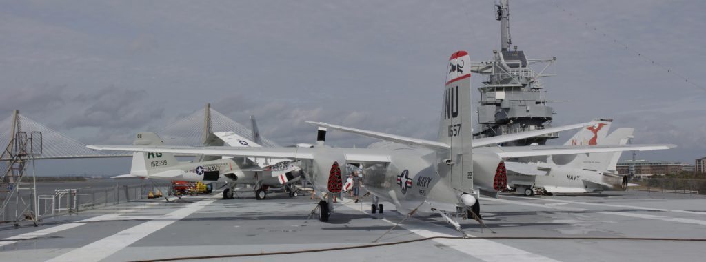 The top deck with several planes on display for viewing.