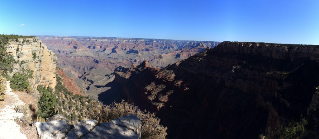 Pipe Creek Vista. Mather point in sunlight. Yaki Point in shadow. The Kaibab trail leads down the side of Yaki Point and out along Cedar Ridge , before crossing over to the other side of Cedar Ridge and down to the Colorado River.
