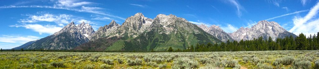 Looking West from the highway near Jenny Lake. The striking rise of the Tetons from the very flat valley is very evident in this shot.