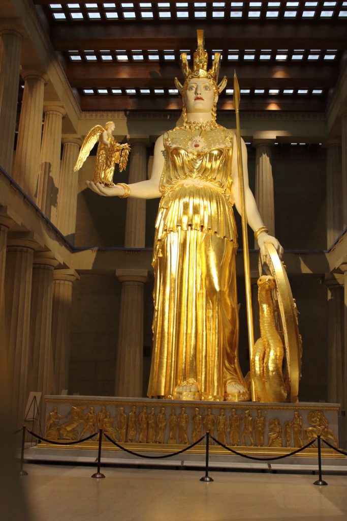 A statue of Athena with Nike on her hand.