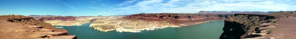 A view looking just south of east. The Colorado River takes a south turn here and runs from straight ahead to the right. You can see the bridge over the river in the distance just where the river narrows.